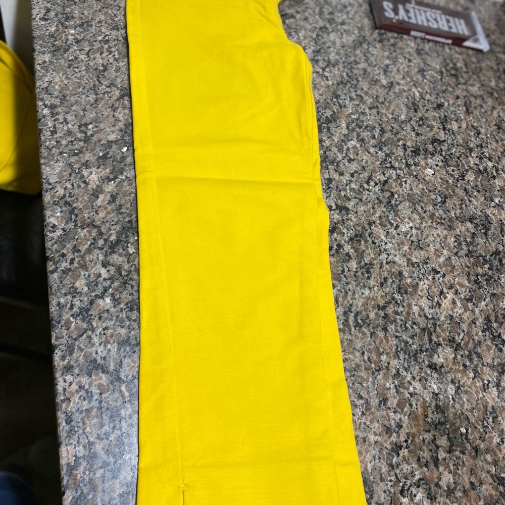 Yellow size 0 pants in good condition.